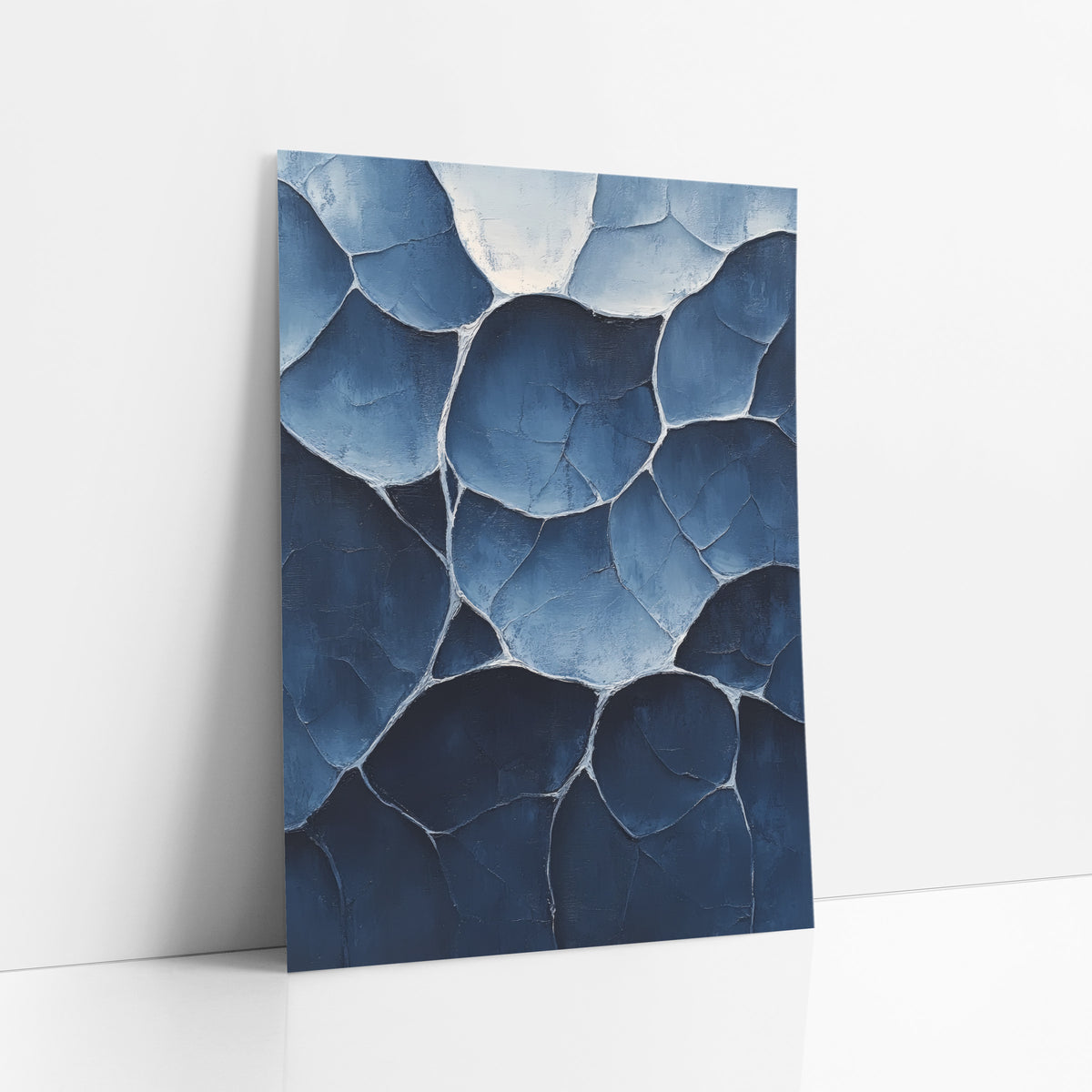 Indigo Rounded Shapes Abstract art print leaning against a white wall – abstract rounded pod shapes with pale outlines
