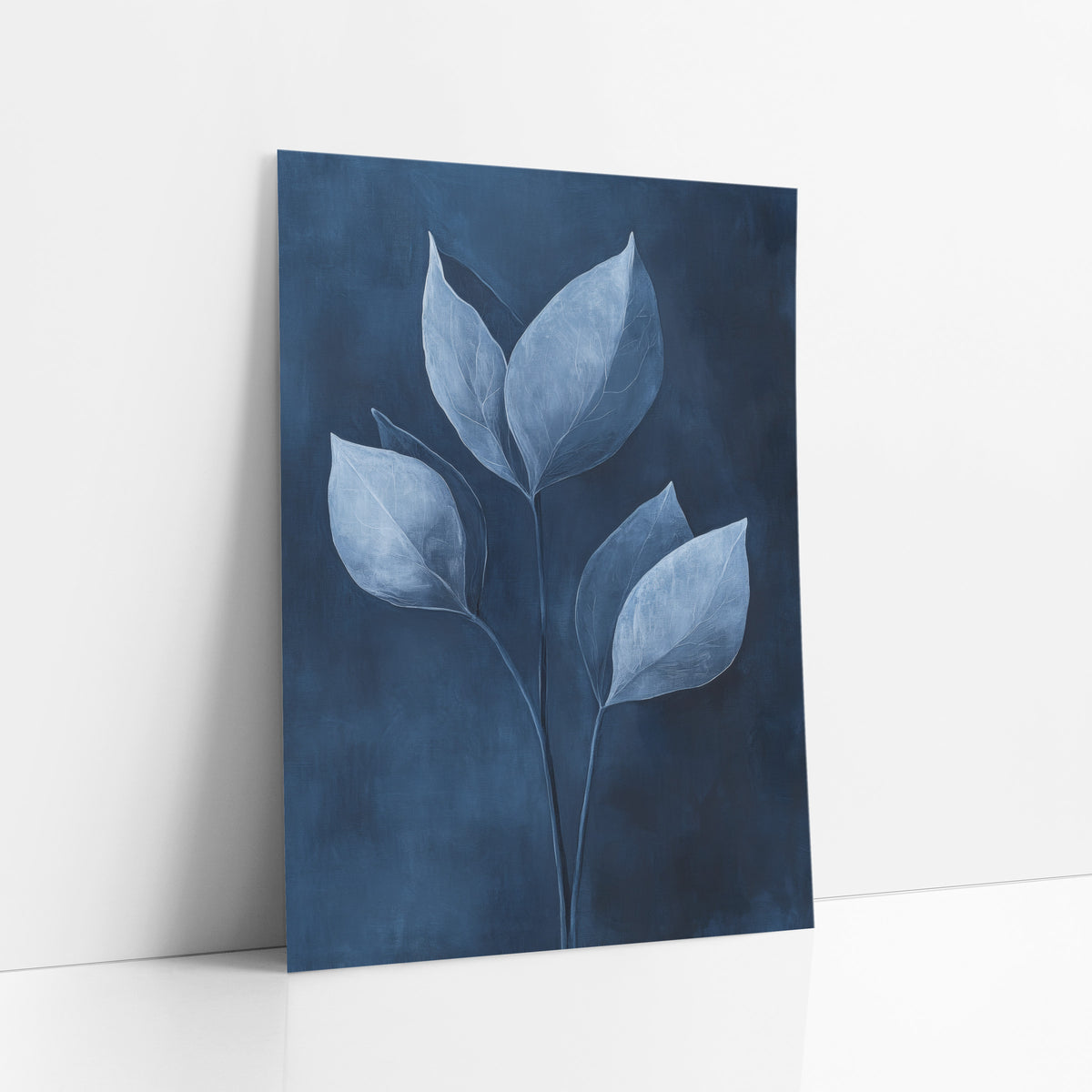 Indigo Leaf Study Botanical art print leaning against a white wall – six pale blue-white leaves on thin curved stems