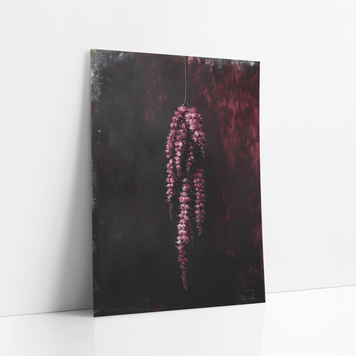 Crimson Hanging Tassels Moody Botanical art print leaning against a white wall – hanging cluster of crimson-pink flower