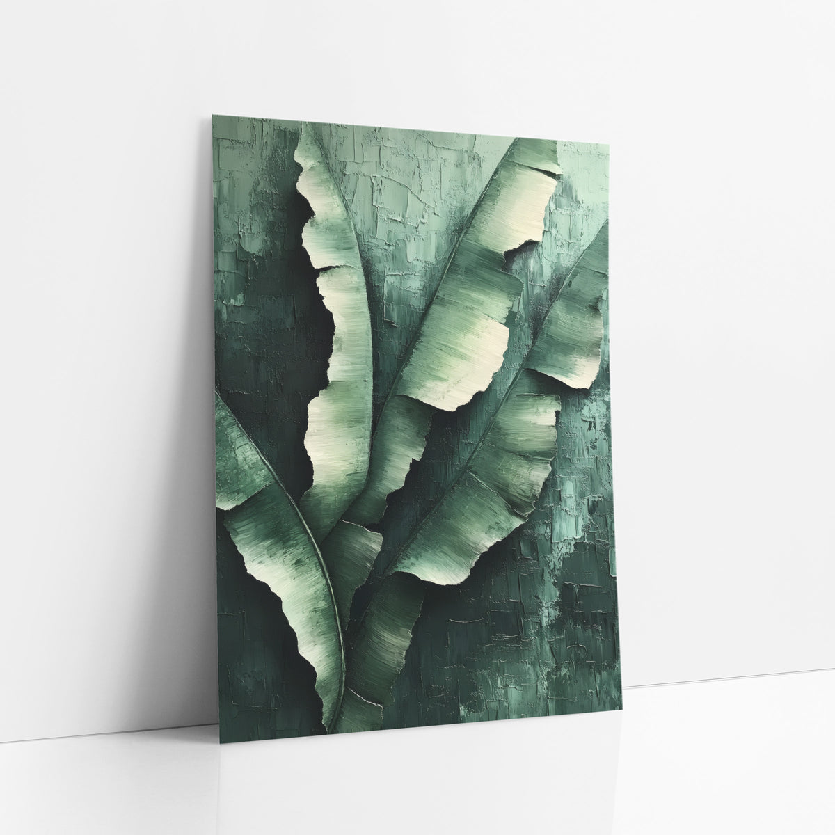 Torn Banana Leaves Luxe art print leaning against a white wall – large green banana leaves with torn edges and cream