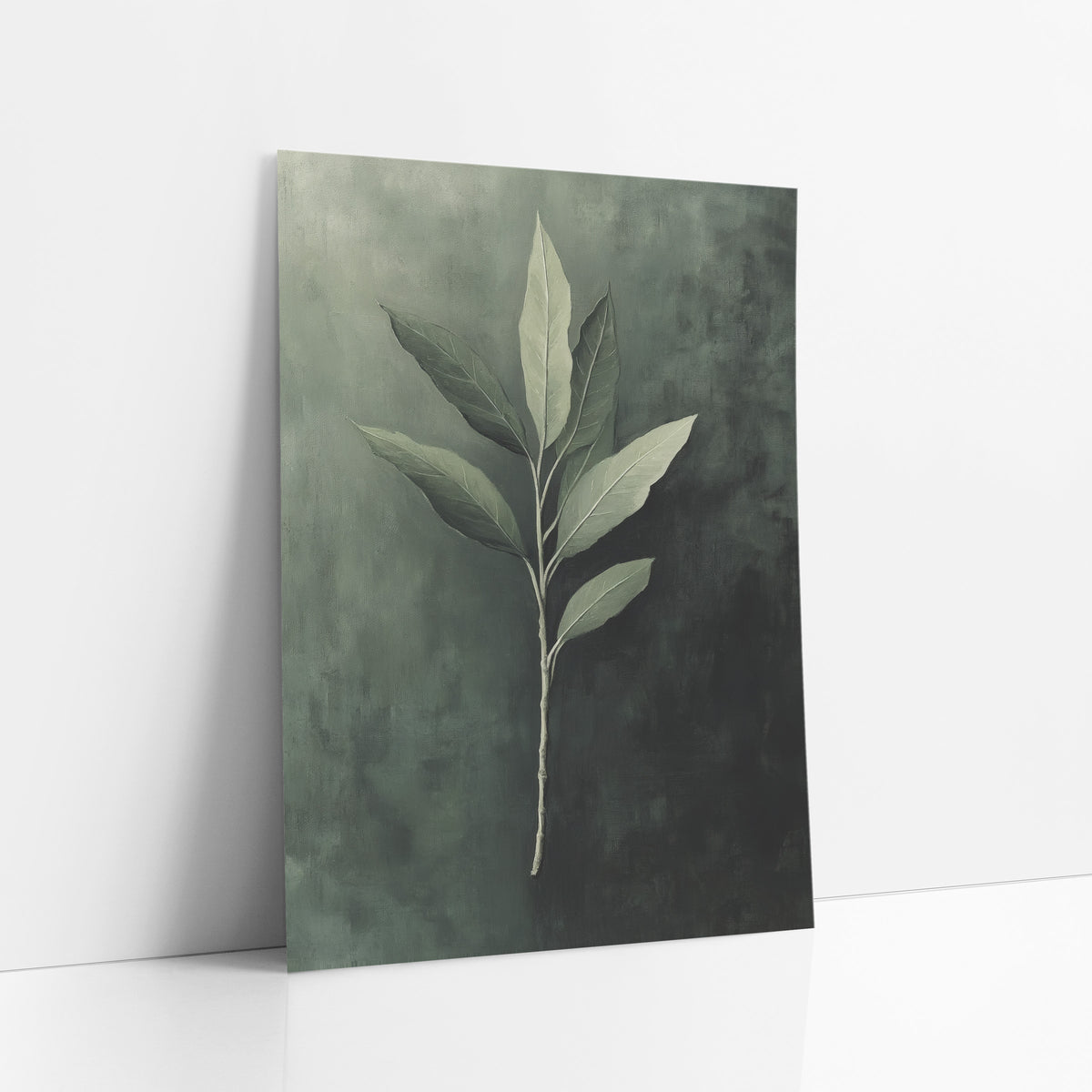 Sage Green Leaf Branch Botanical art print leaning against a white wall – slender branch with seven pointed sage green leaves