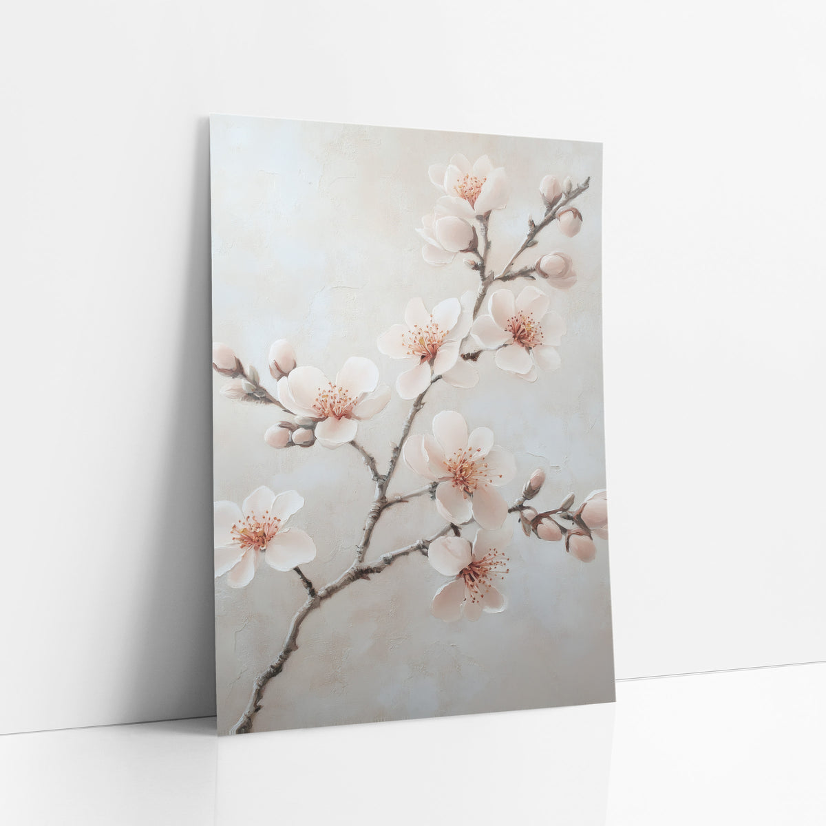 Spreading Blossom Bough Ivory Botanical art print leaning against a white wall – branch with blush pink blossoms and buds