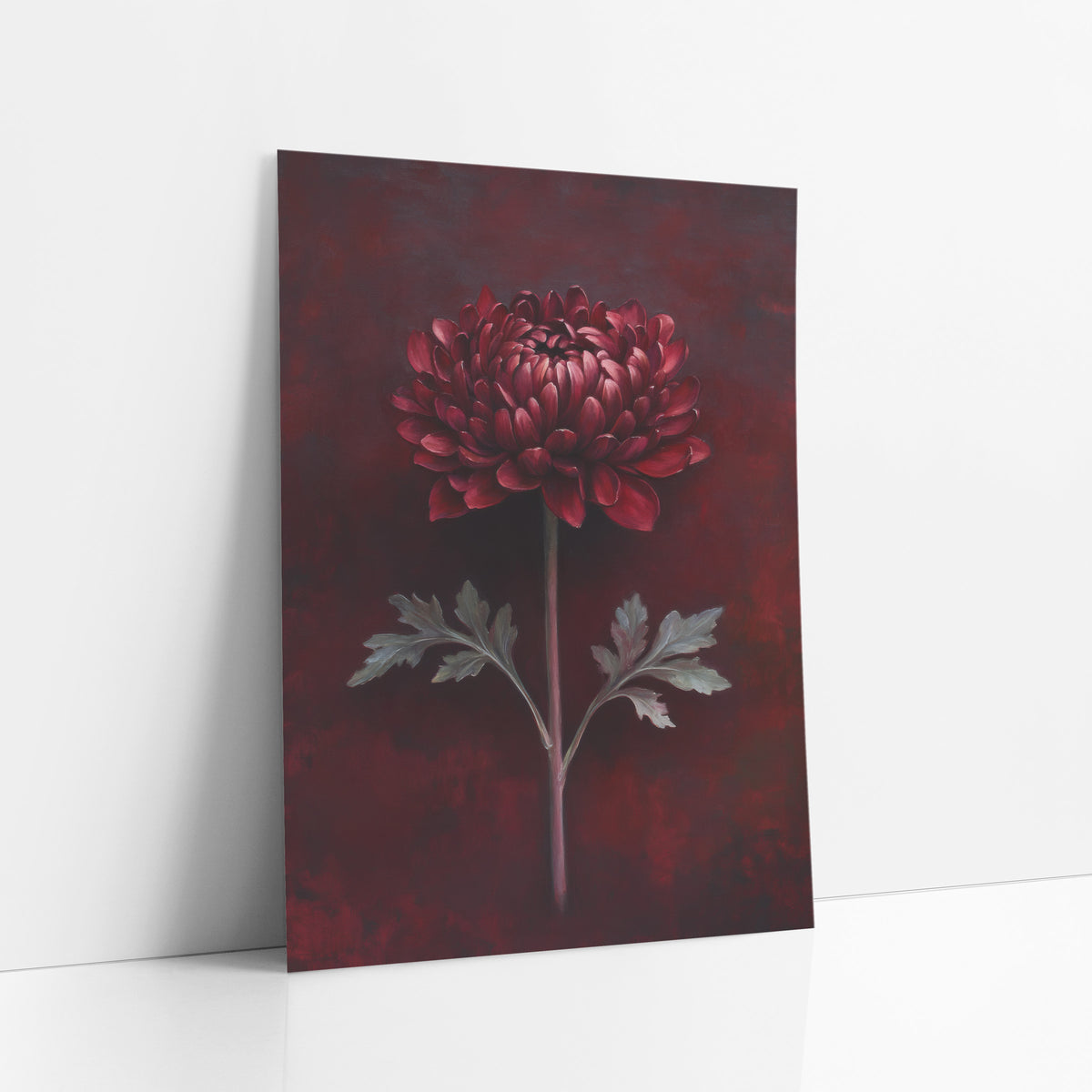 Burgundy Chrysanthemum Moody Botanical art print leaning against a white wall – single burgundy chrysanthemum on a long stem