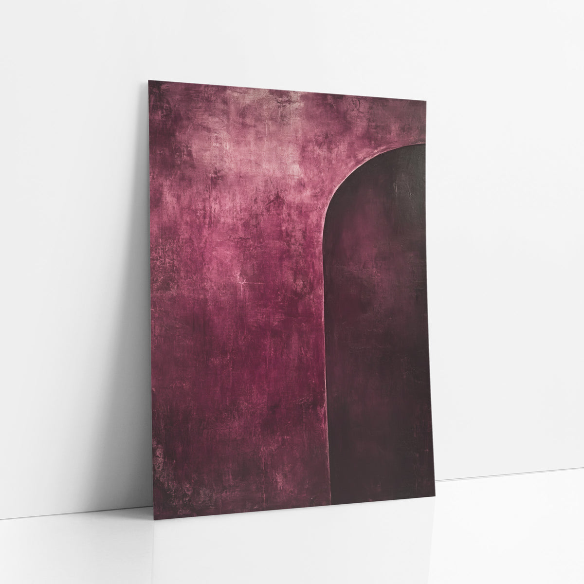 Burgundy Arc Abstract Modern art print leaning against a white wall – abstract artwork with a dark plum arched shape