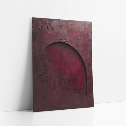 Wine Red Archway Luxe Abstract art print leaning against a white wall – abstract burgundy wall with a large arched opening