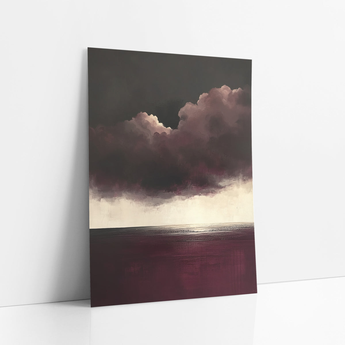 Burgundy Anvil Cloud Cream Horizon art print leaning against a white wall – abstract seascape with dark plum storm clouds