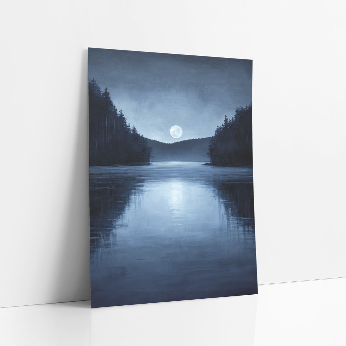 Moonlit Lake Night Landscape art print leaning against a white wall – full moon above a calm night lake with dark evergreen