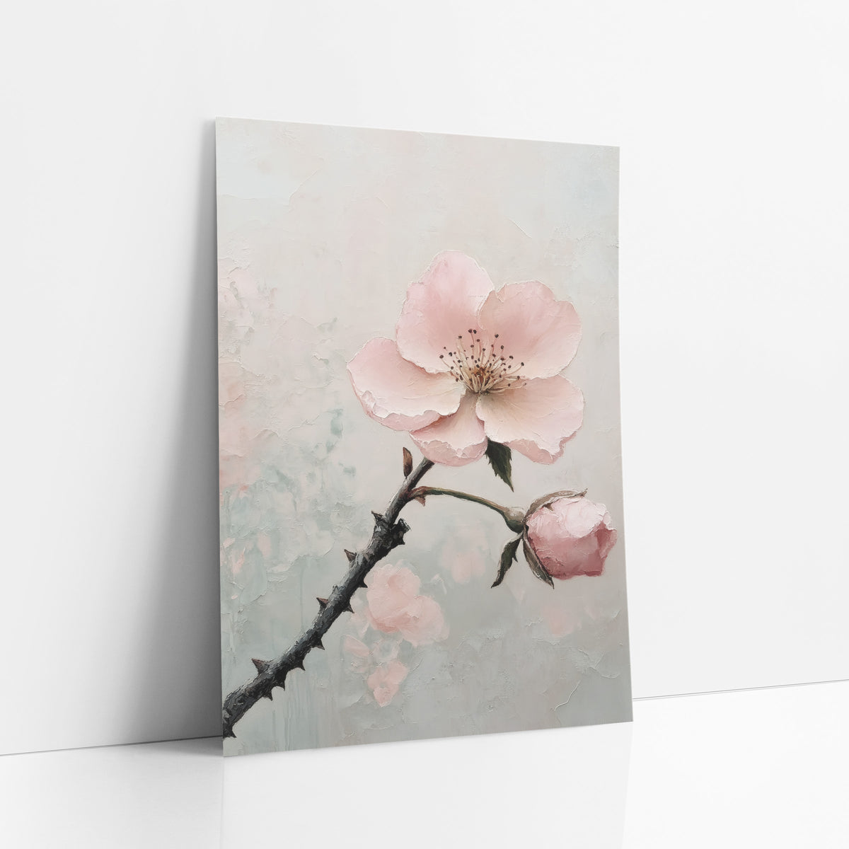 Blush Pink Blossom Branch Botanical art print leaning against a white wall – blush pink blossom and bud on a dark thorny