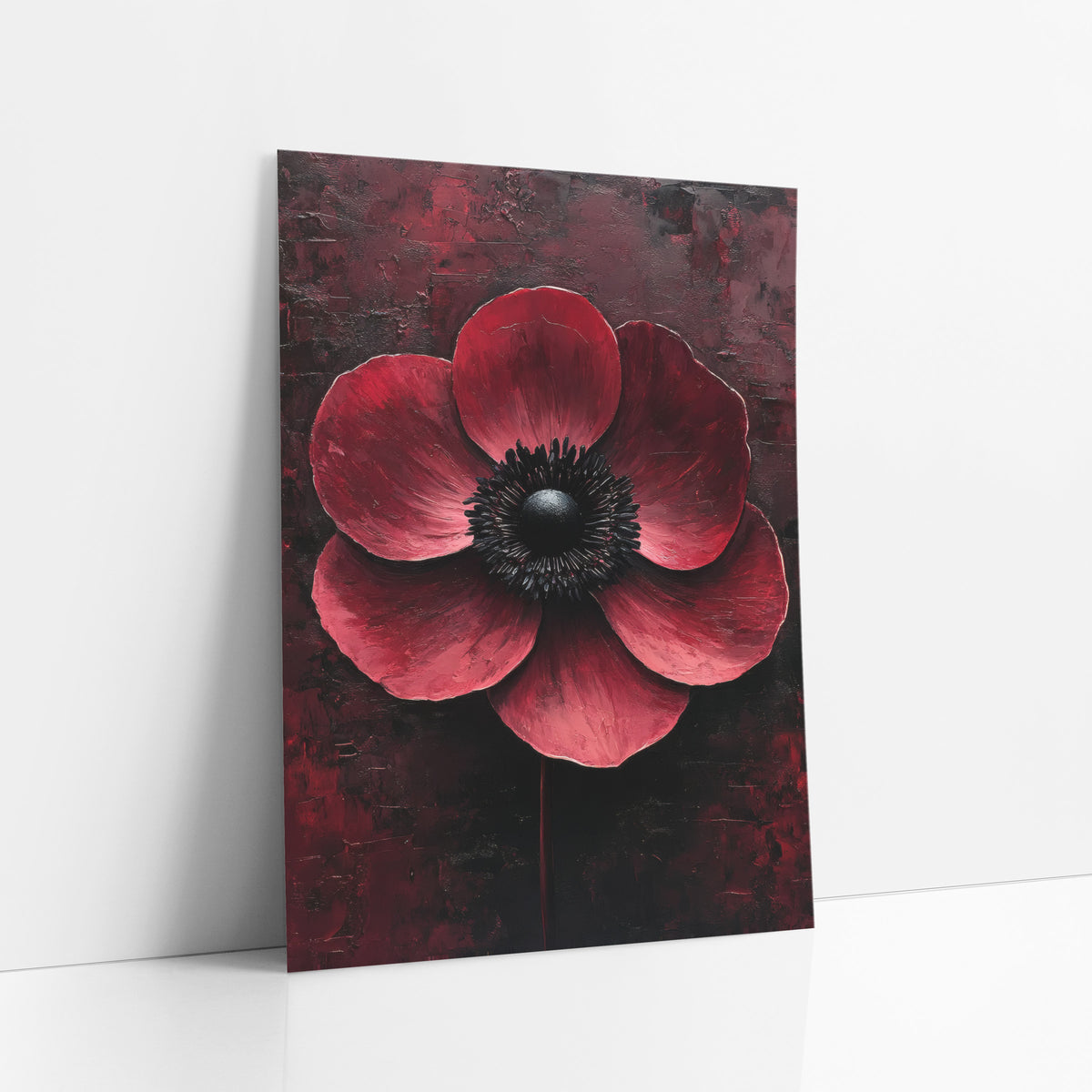 Crimson Anemone Black Center Moody art print leaning against a white wall – large crimson anemone with a black center