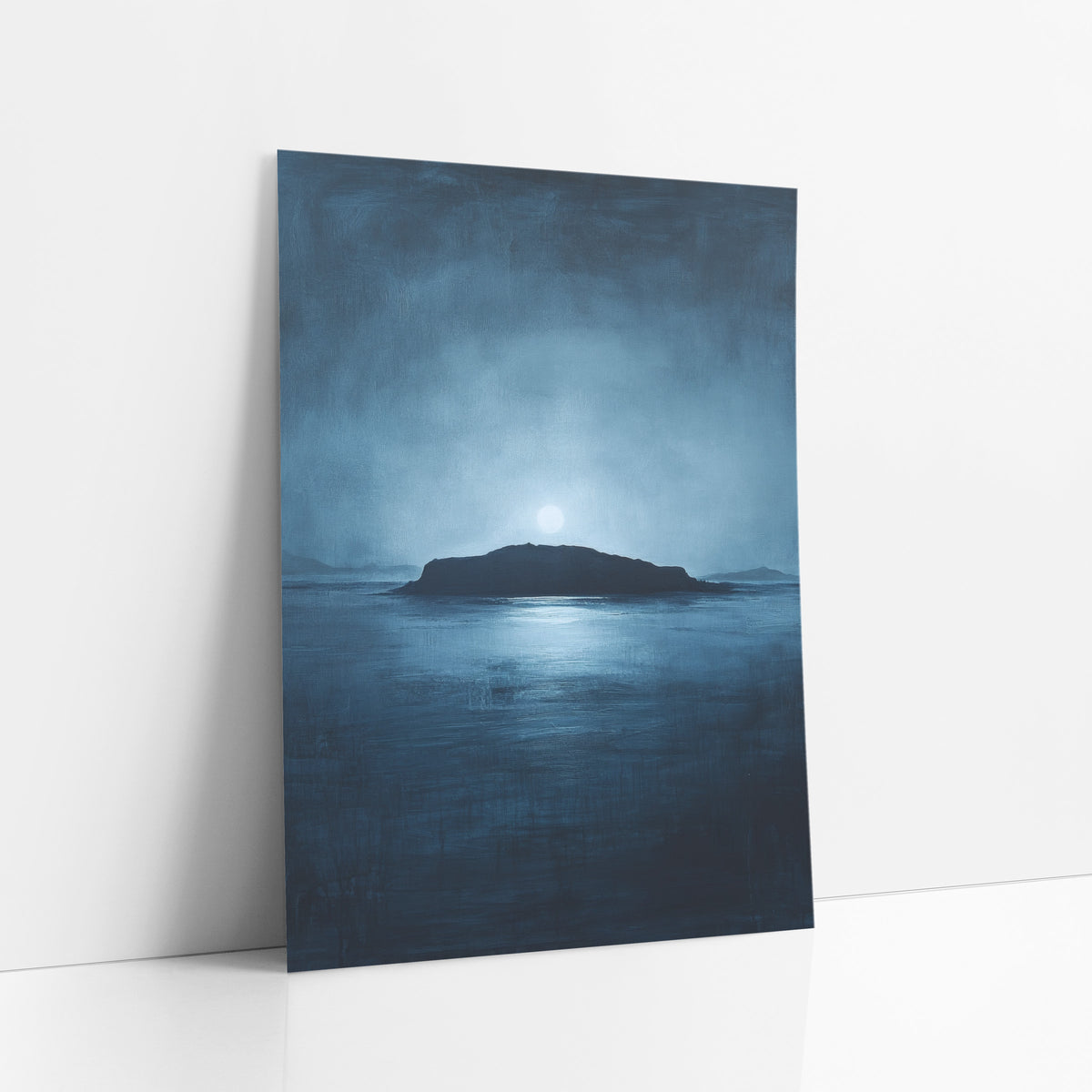 Moonlit Island Silhouette Seascape art print leaning against a white wall – dark island silhouette on a calm navy sea