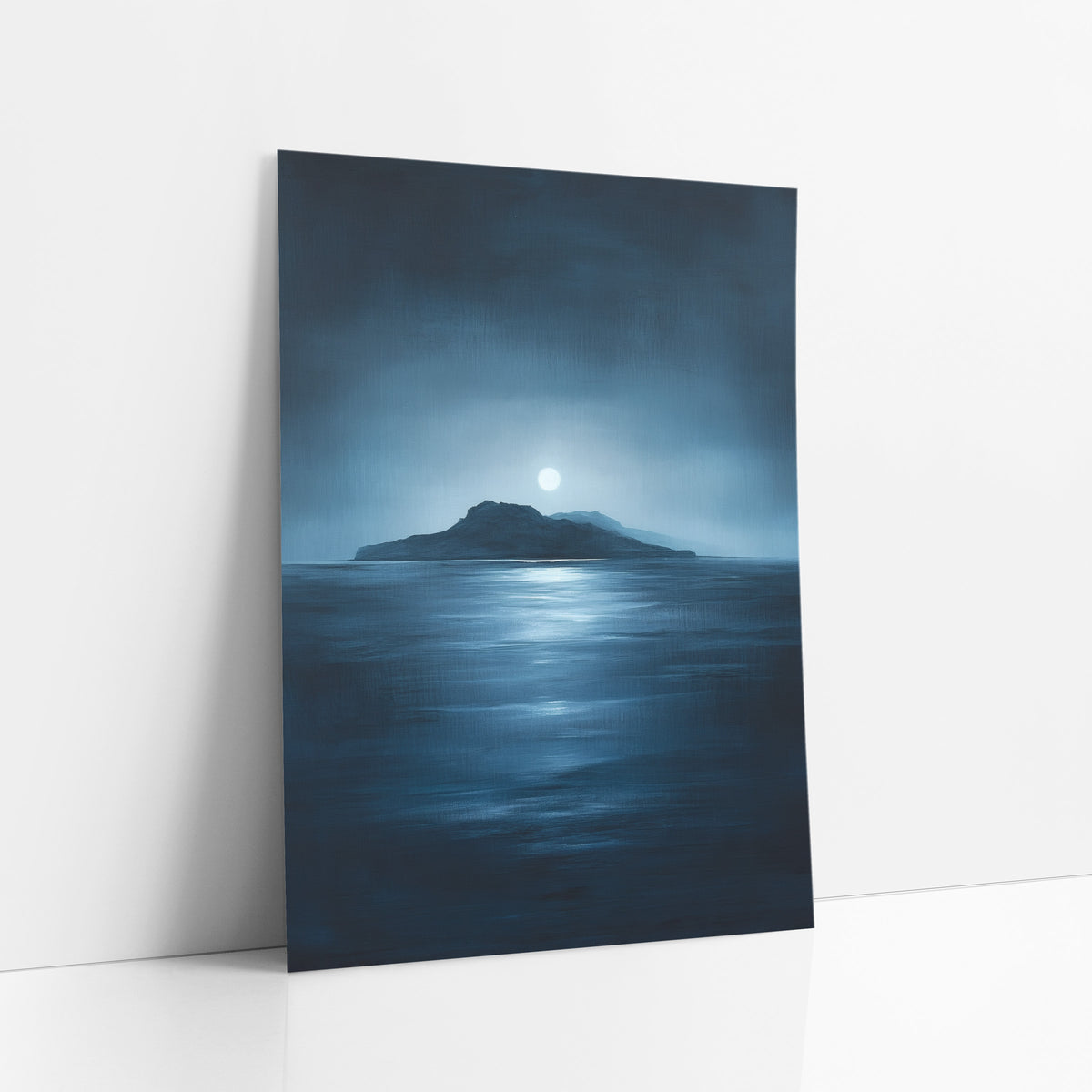 Low Island Pale Moon Seascape art print leaning against a white wall – dark island on the horizon under a pale full moon