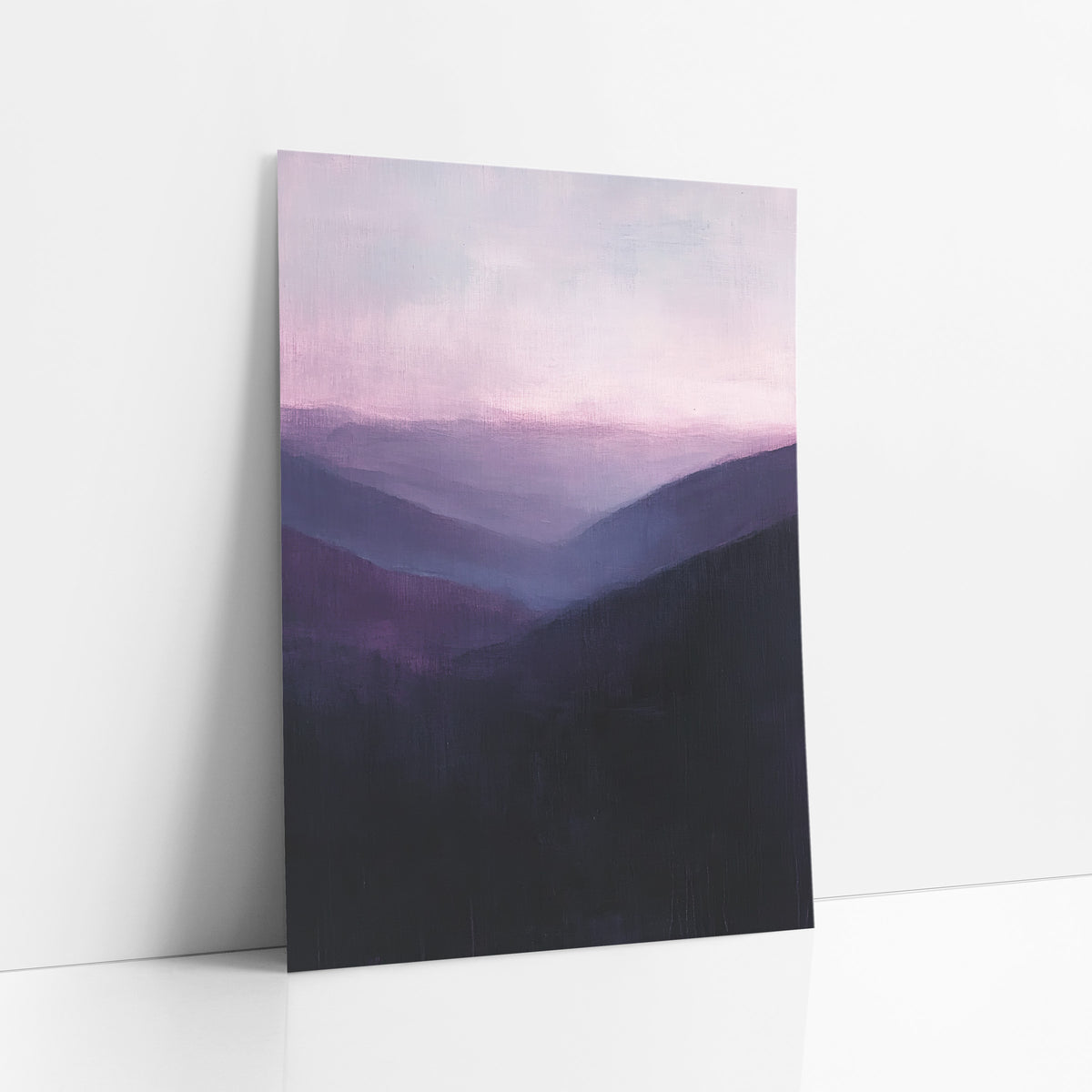 Violet Mountain Valley Layers Landscape art print leaning against a white wall – misty mountain valley with layered ridges