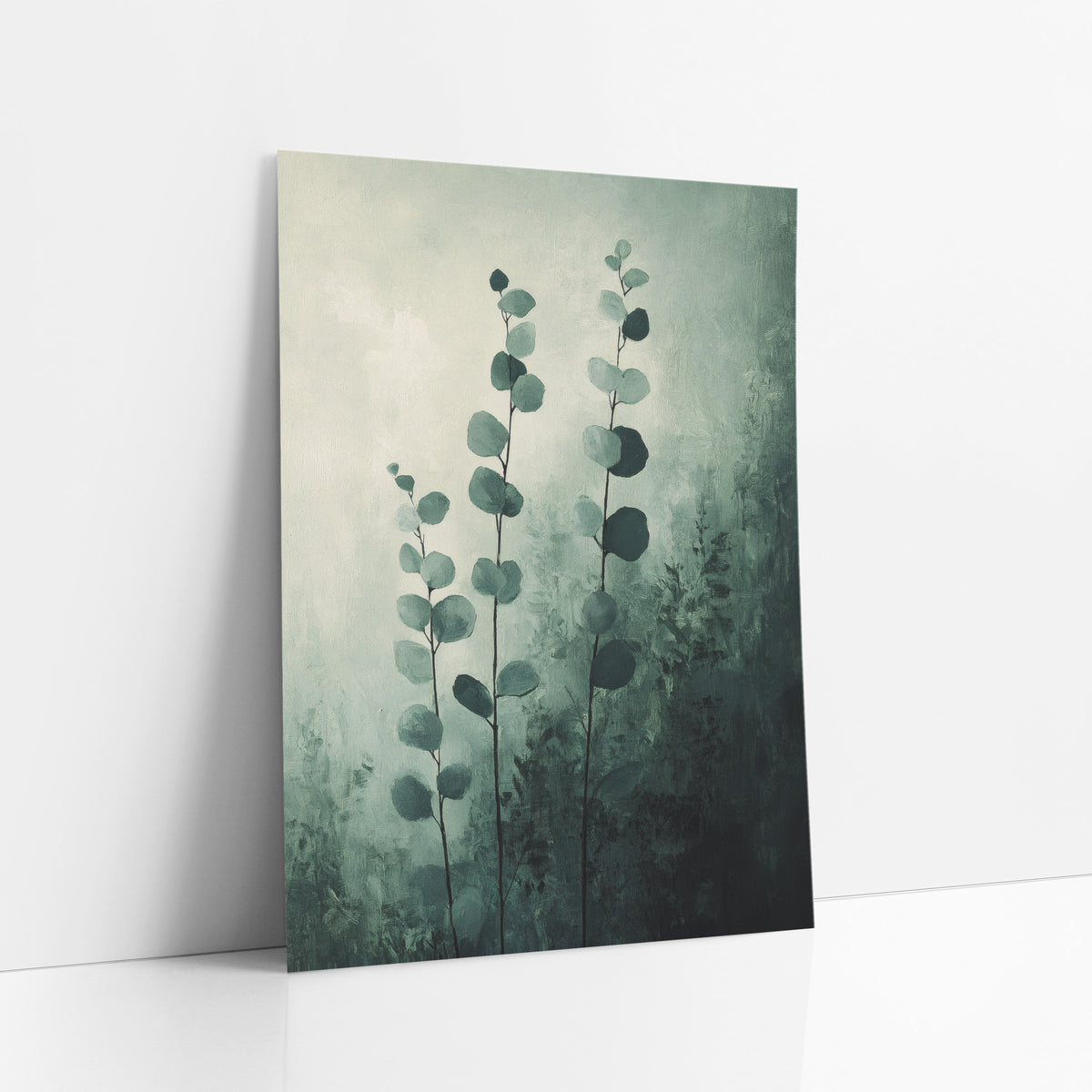 Misty Green Eucalyptus Stems Botanical art print leaning against a white wall – three tall eucalyptus stems with round