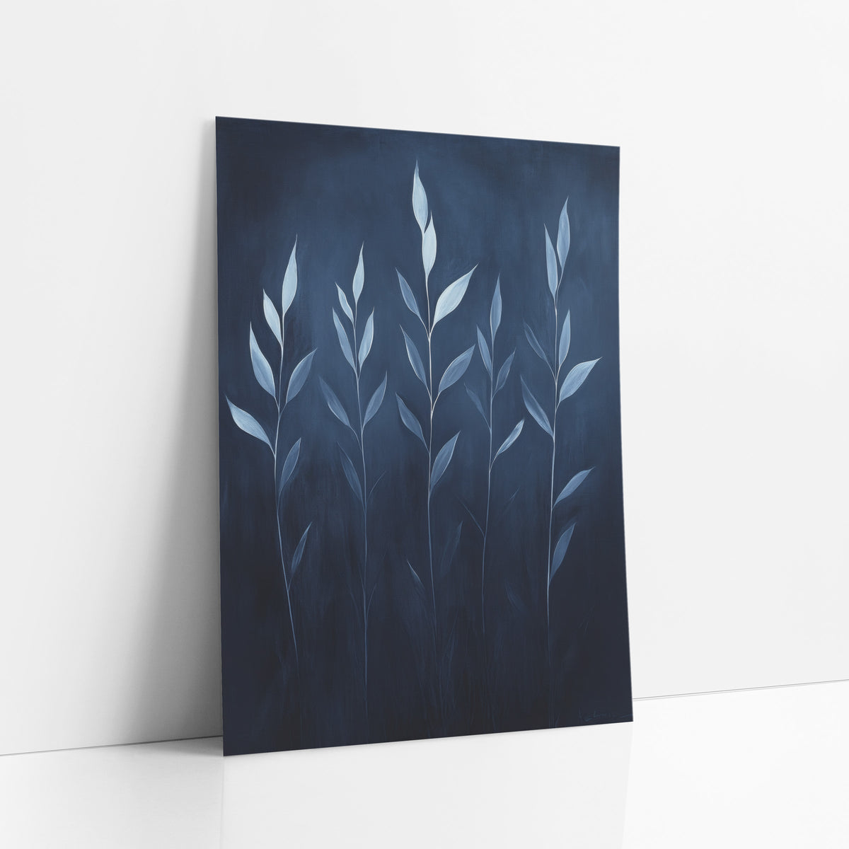 Five Pale Reed Stalks Midnight art print leaning against a white wall – five slender stems with pale blue-white leaves rising