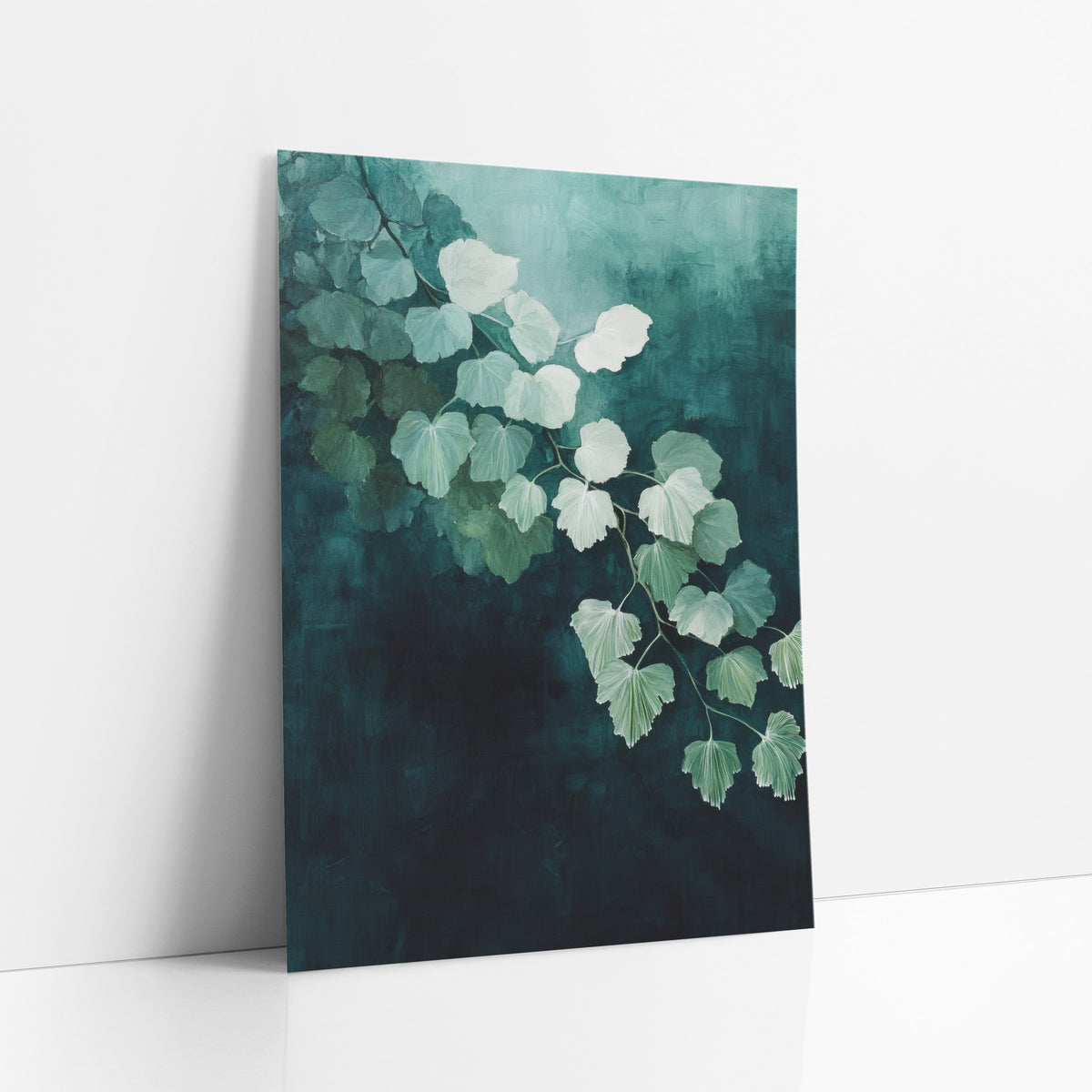 Teal Maidenhair Leaf Cascade Botanical art print leaning against a white wall – branch of pale mint fan-shaped leaves