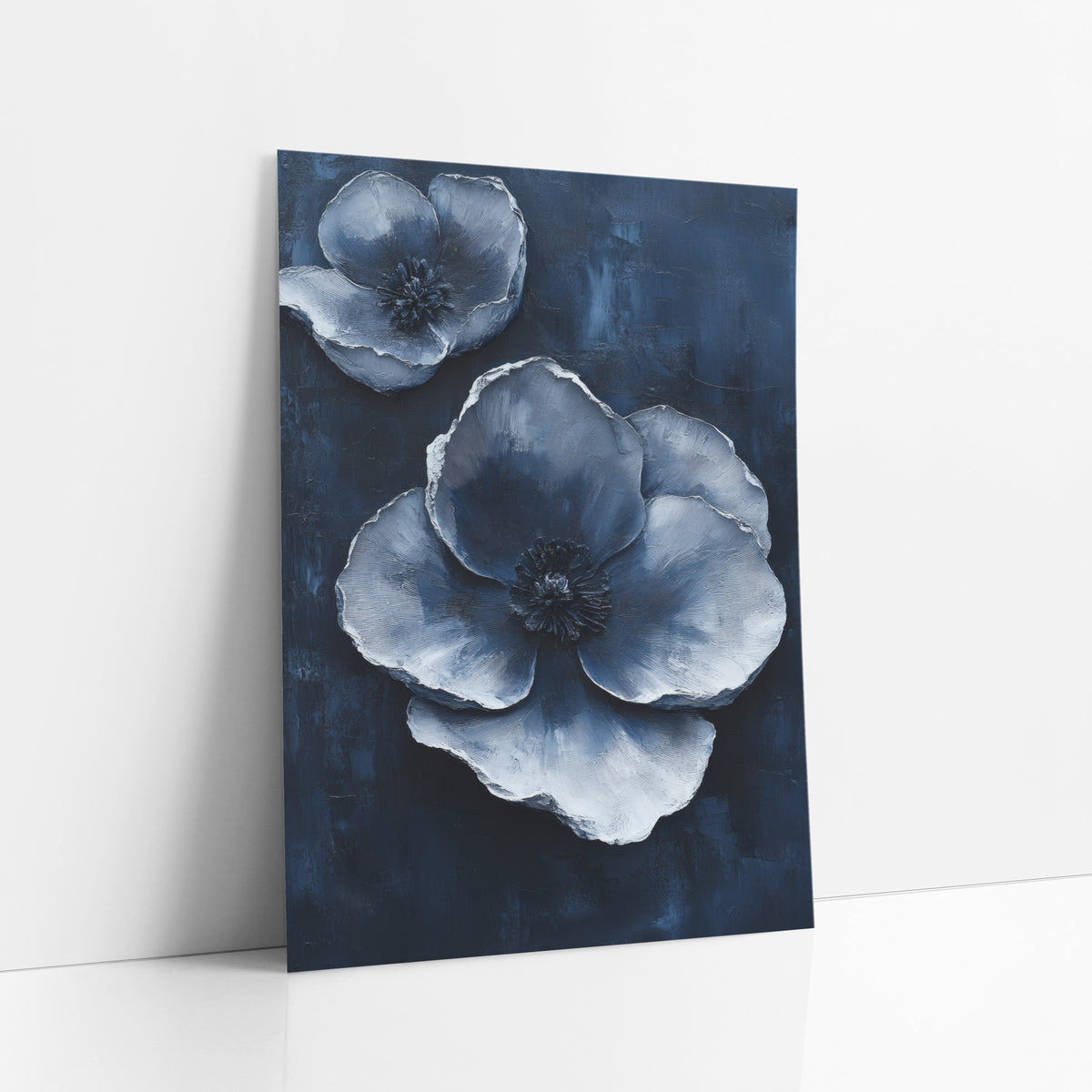 Silvery Blue Poppies Luxe Modern art print leaning against a white wall – two large silver-blue blossoms with layered petals