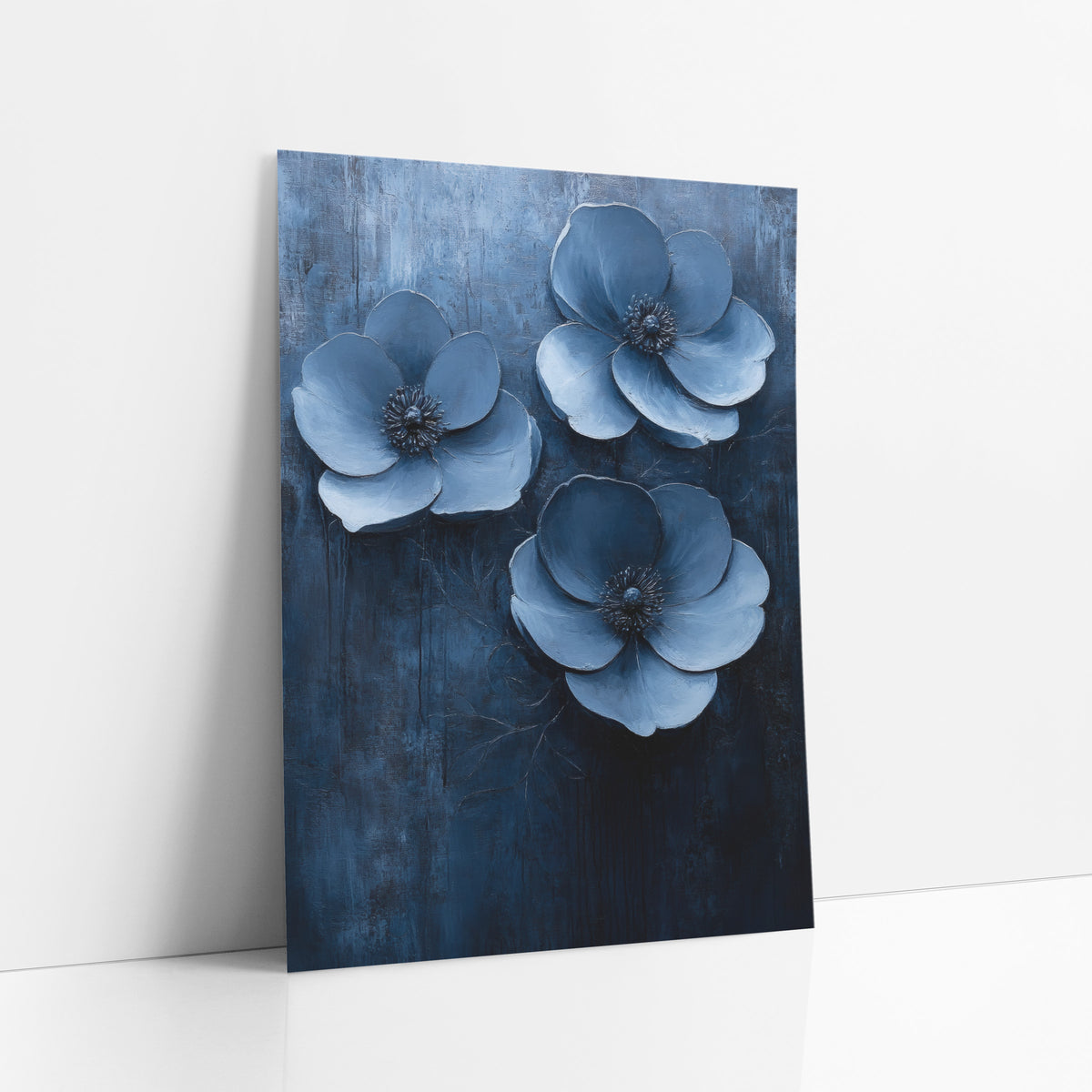 Triple Denim Blue Flower Trio art print leaning against a white wall – three large powder blue flowers with dark centers