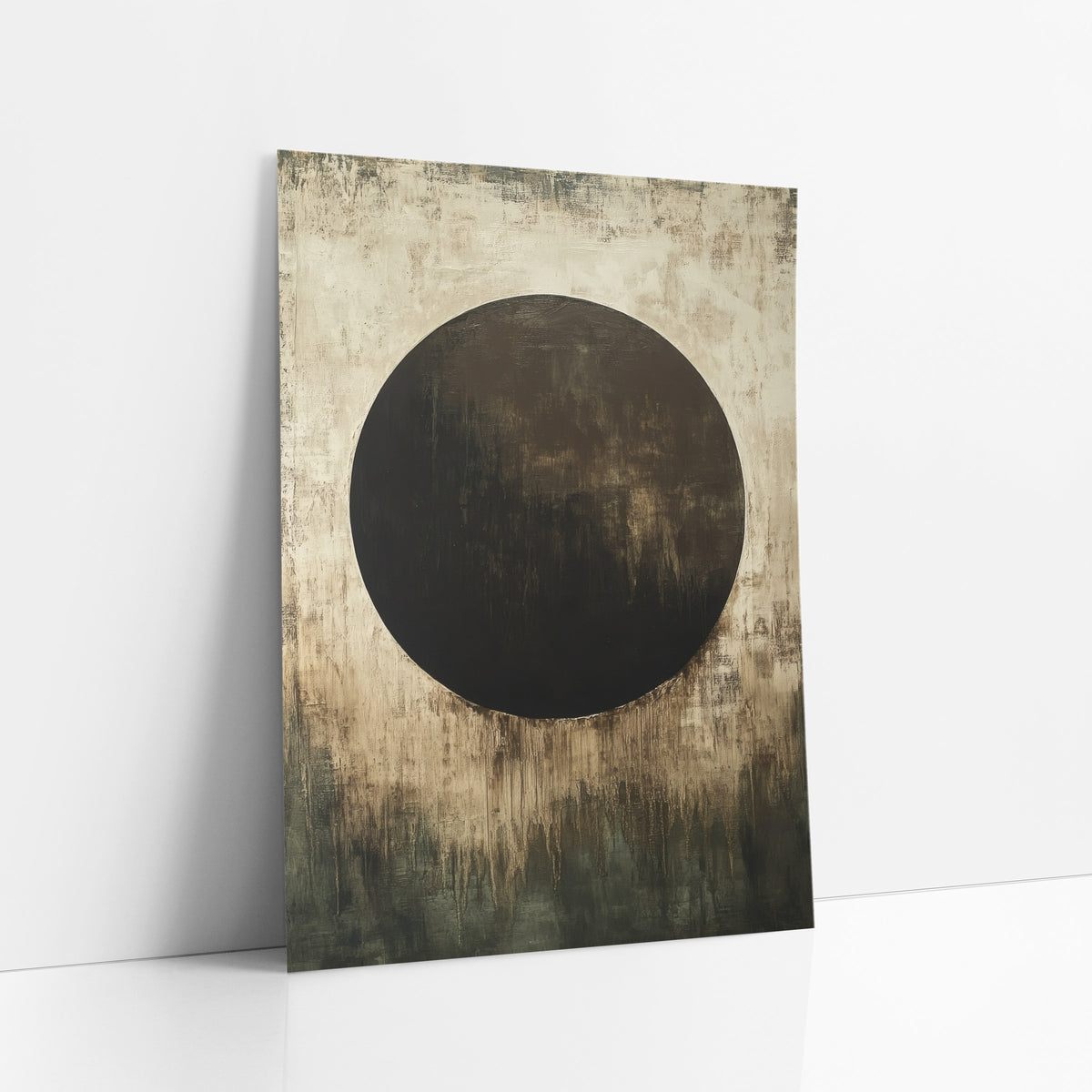 Chocolate Circle Olive Abstract art print leaning against a white wall – large dark brown circle on a scuffed cream ground