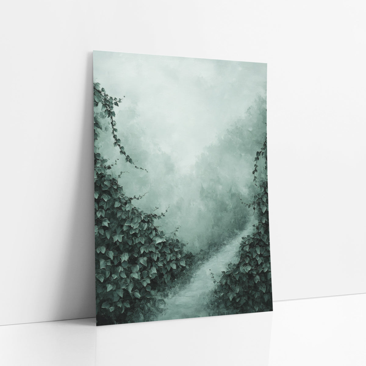 Misty Ivy Garden Path Landscape art print leaning against a white wall – dark green ivy on both sides of a pale winding path