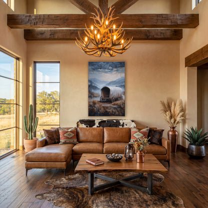 Pale Wagon Foggy Meadow wall art in a rustic western-style room – weathered covered wagon on a stone path in a misty