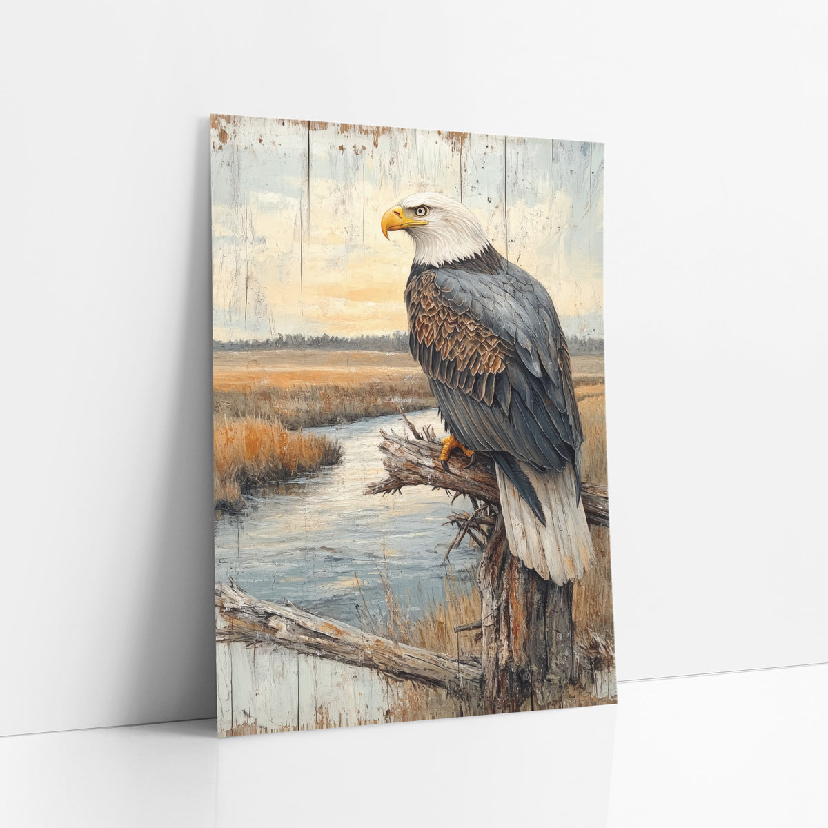 Perched Bald Eagle Marsh Rustic art print leaning against a white wall – bald eagle perched on a bare gray branch above