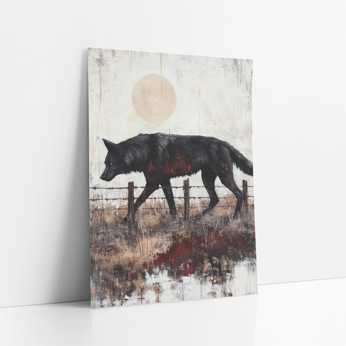 Black Wolf Fence Line Western art print leaning against a white wall – black wolf walking past a barbed wire fence and wooden