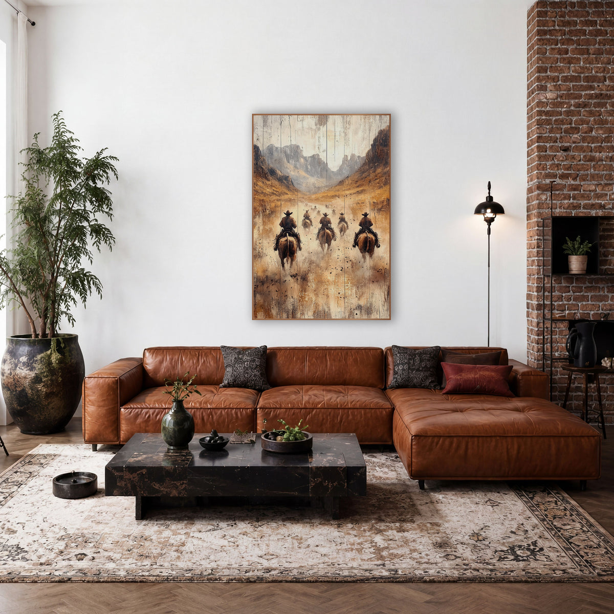 Cowboys Riding Dusty Valley Western wall art in a rustic western-style room – cowboys on brown horses ride away down