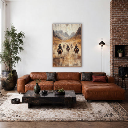 Cowboys Riding Dusty Valley Western wall art in a rustic western-style room – cowboys on brown horses ride away down