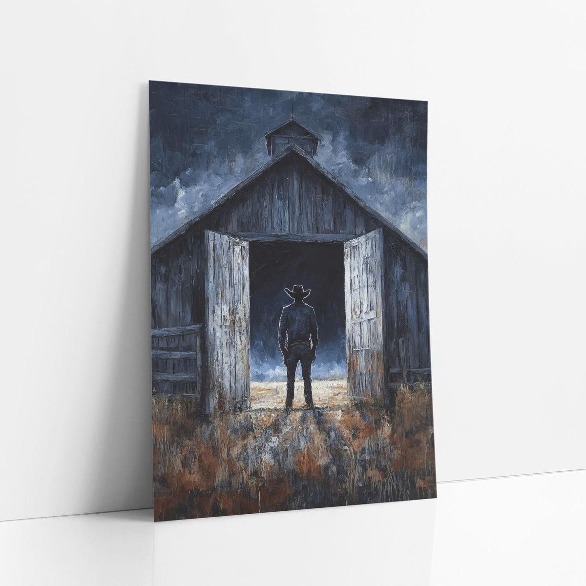 Cowboy in Barn Doorway Western art print leaning against a white wall – cowboy silhouette standing in open doors
