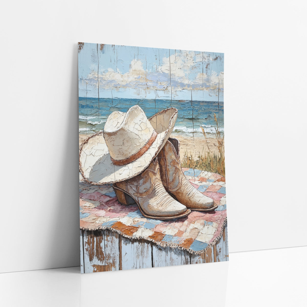 Cream Hat Boots Patchwork Rustic art print leaning against a white wall – cream cowboy hat and tan boots on a pink and blue