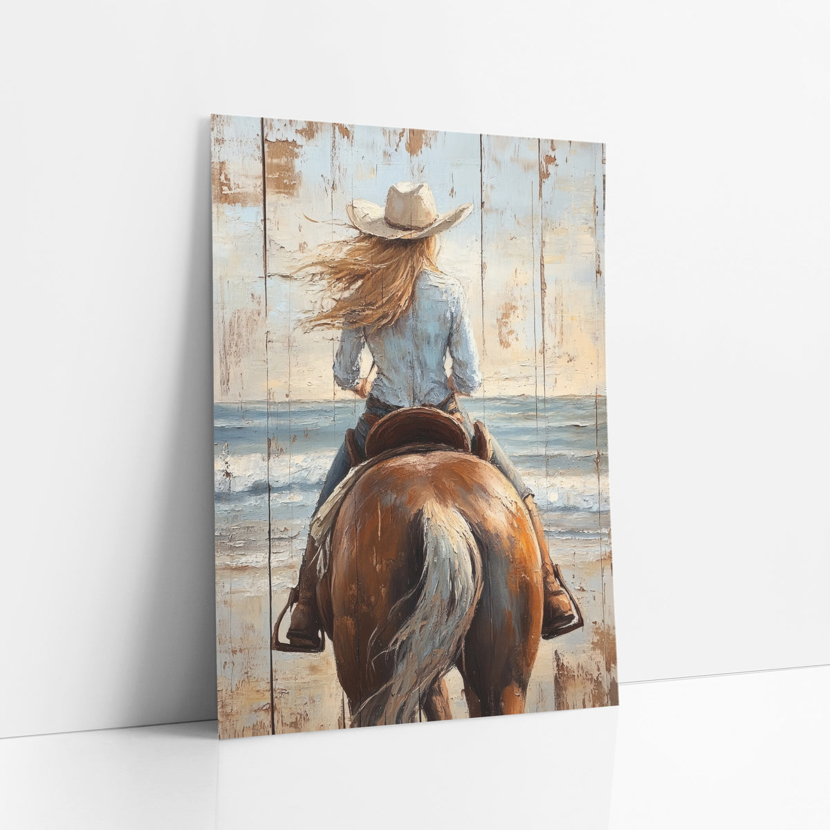 Windswept Blonde Cowgirl Close Western art print leaning against a white wall – cowgirl in a cream hat and blue shirt riding