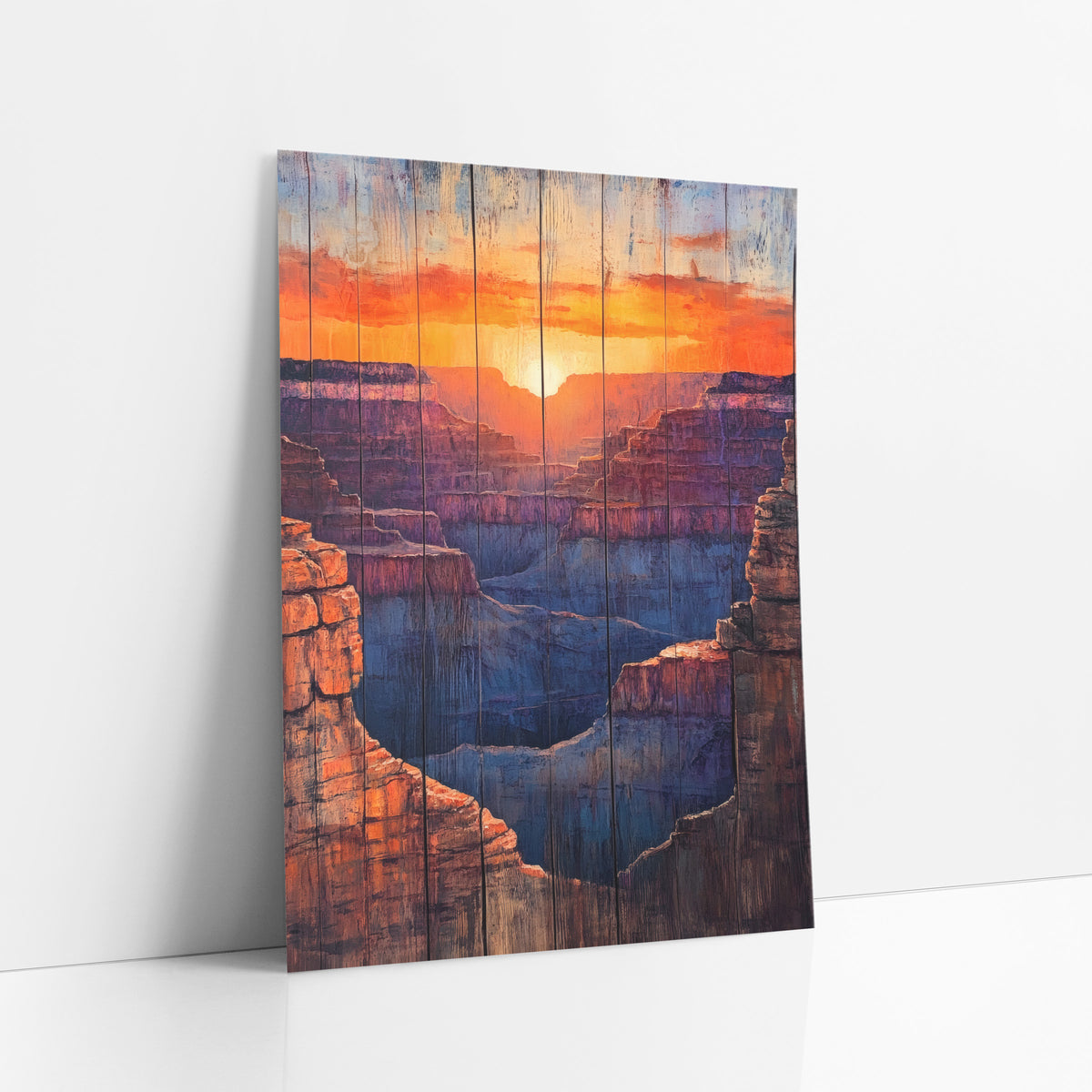 Layered Canyon Sunset Western Decor art print leaning against a white wall – canyon sunset with a glowing sun, orange clouds