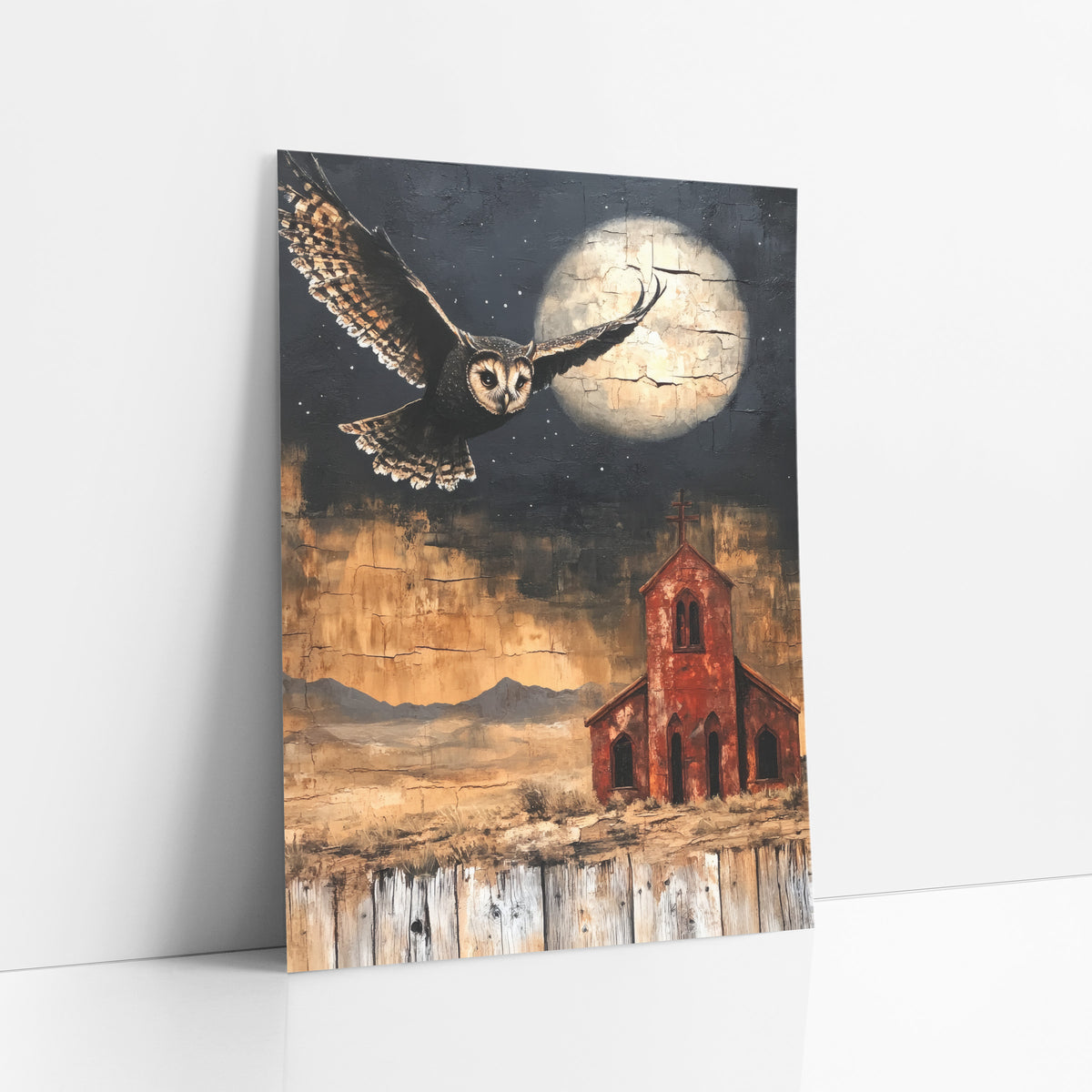 Flying Owl Desert Chapel Western art print leaning against a white wall – owl in flight beside a pale cracked moon above