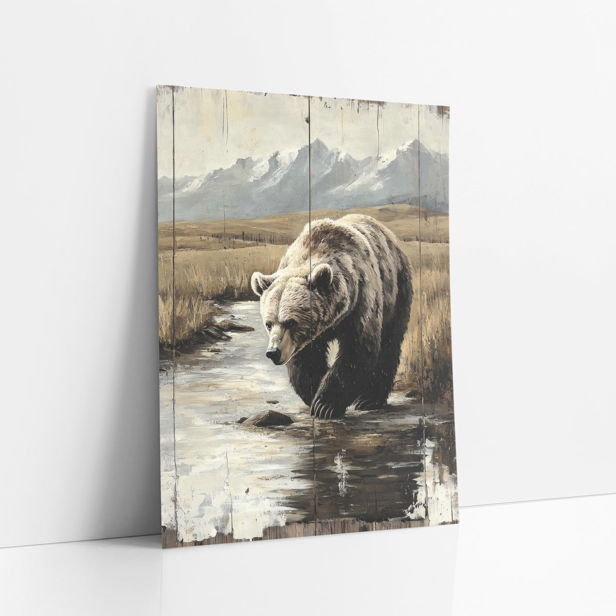 Snowcap Creek Grizzly Distressed Plank art print leaning against a white wall – grizzly bear wading a shallow stream