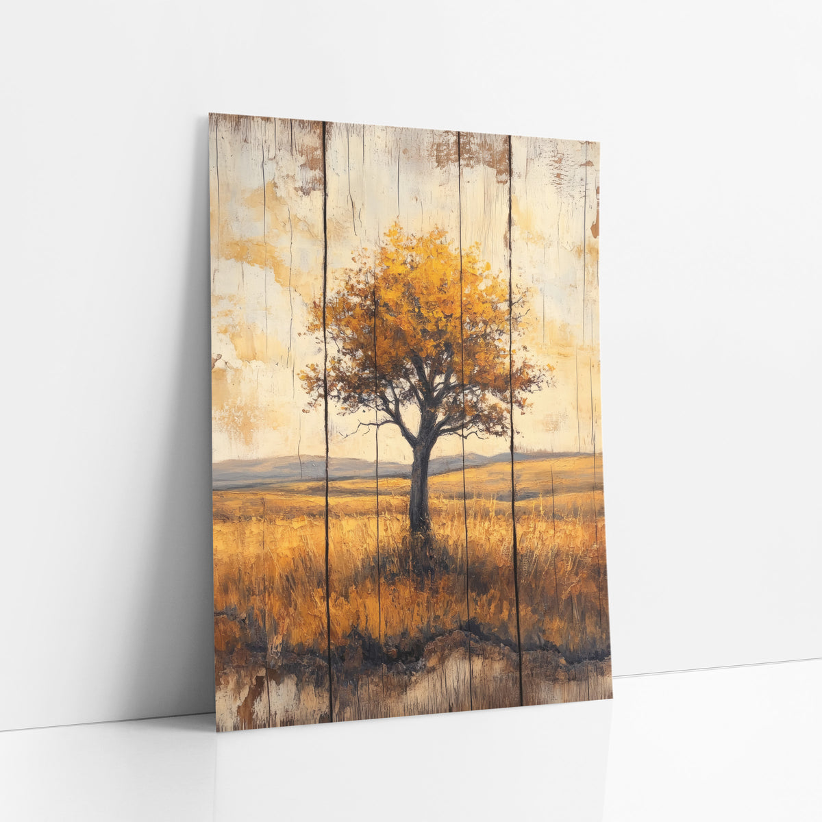 Lone Golden Tree Prairie Landscape art print leaning against a white wall – lone tree with golden-orange leaves in dry