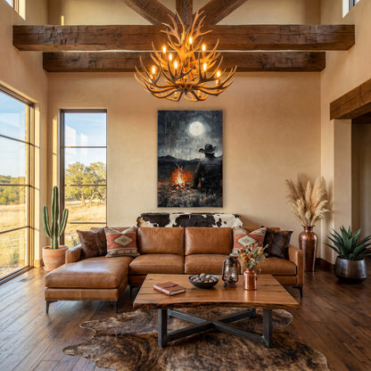 Lone Cowboy Campfire Moonlit Western wall art in a rustic western-style room – cowboy in hat seen from behind, sitting