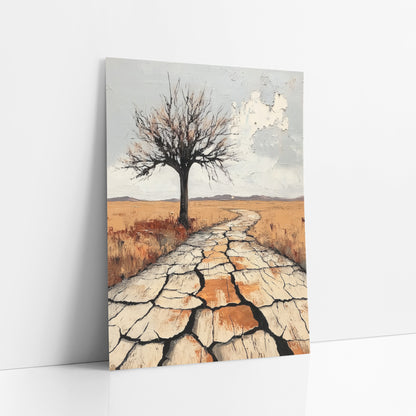 Lone Bare Tree Western Desert art print leaning against a white wall – lone bare tree beside a winding path of cracked pale