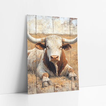 Plank Panel Longhorn Face Rustic art print leaning against a white wall – longhorn bull lying in dry golden grass, wide