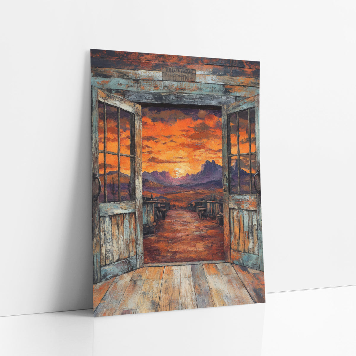 Open Saloon Doors Sunset Western art print leaning against a white wall – open weathered saloon doors looking out