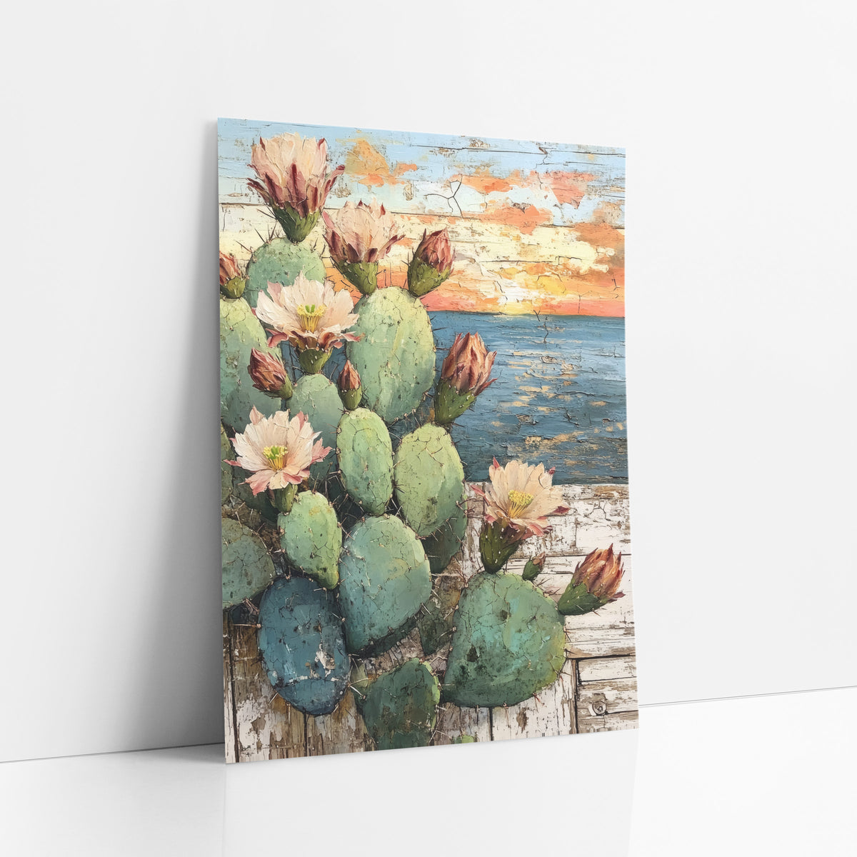 Ocean Sunset Cactus Coastal Western art print leaning against a white wall – prickly pear cactus with pink blossoms and buds