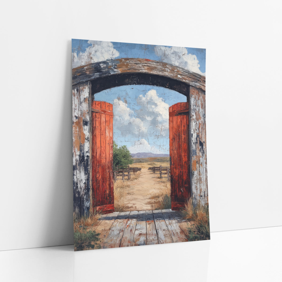 Open Red Ranch Gate Western art print leaning against a white wall – open red ranch gate in a weathered wooden arch