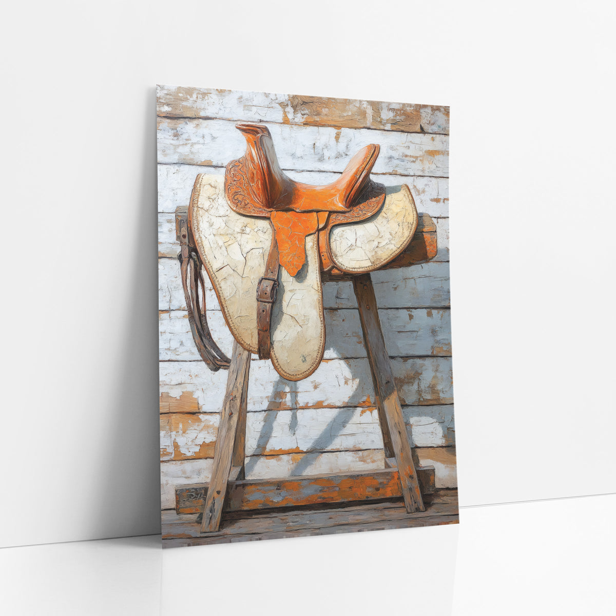 Orange Leather Saddle Western Rustic art print leaning against a white wall – orange tooled leather western saddle with cream