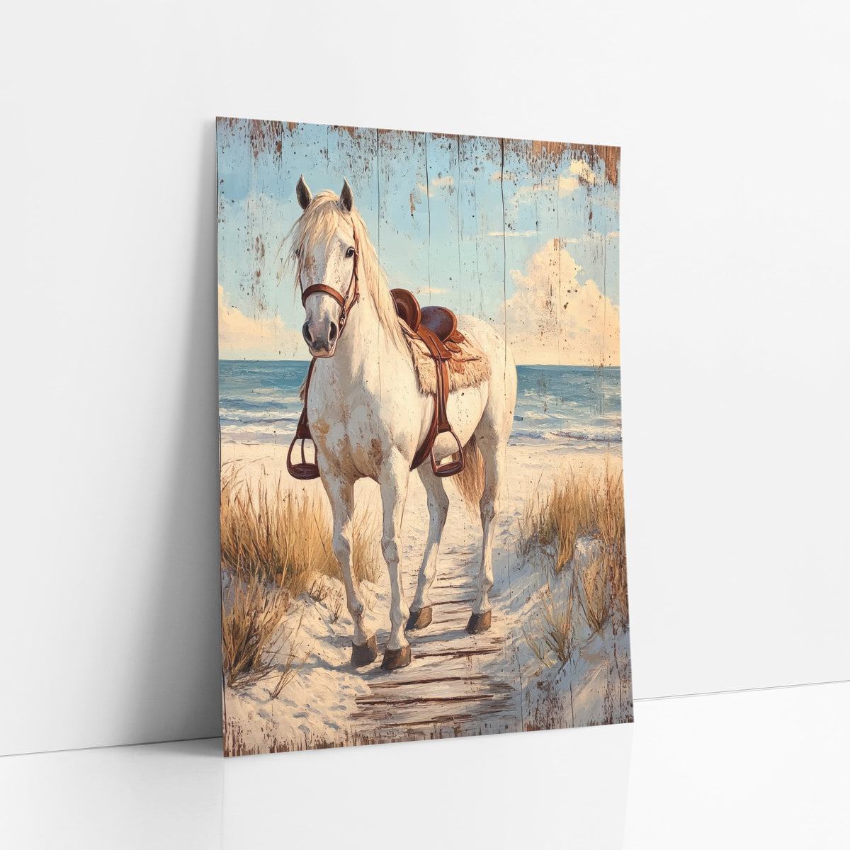 Facing White Horse Boardwalk Trail art print leaning against a white wall – white horse with a brown leather saddle