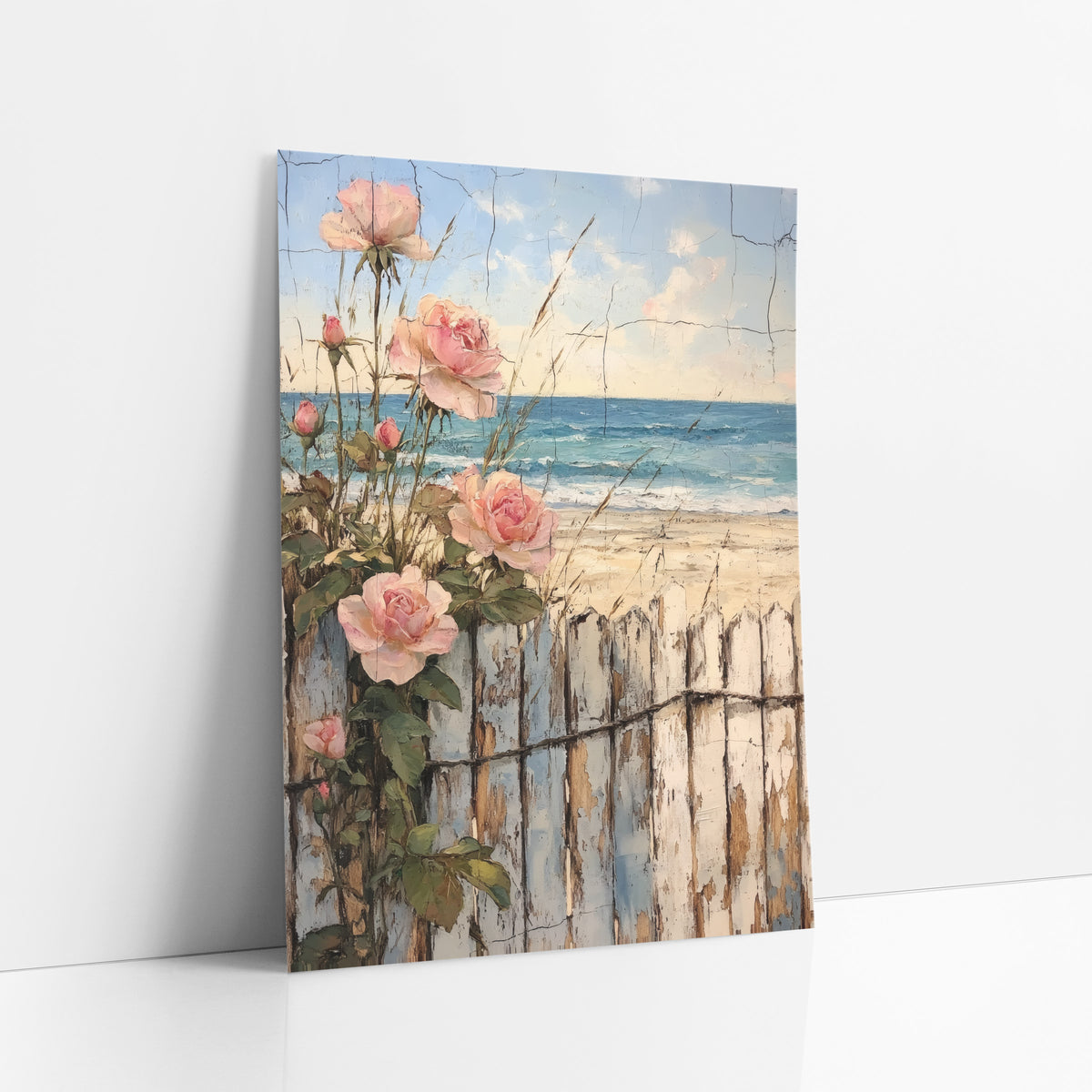 Pink Roses Beach Fence Coastal art print leaning against a white wall – pink roses climbing a weathered white fence
