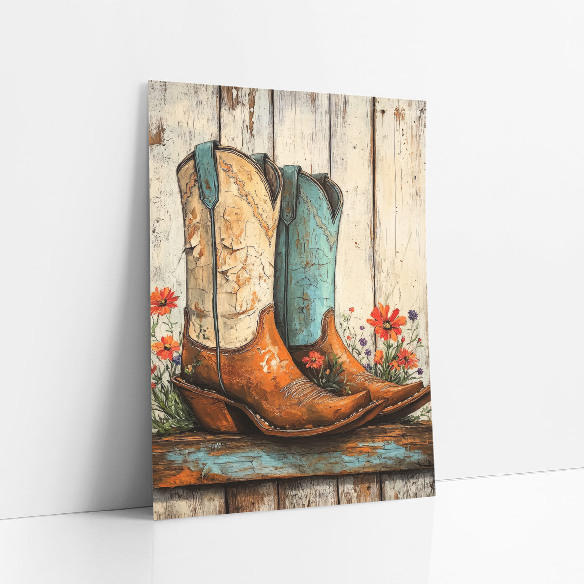 Worn Cowboy Boots Wildflower Western art print leaning against a white wall – pair of cowboy boots, one cream and one