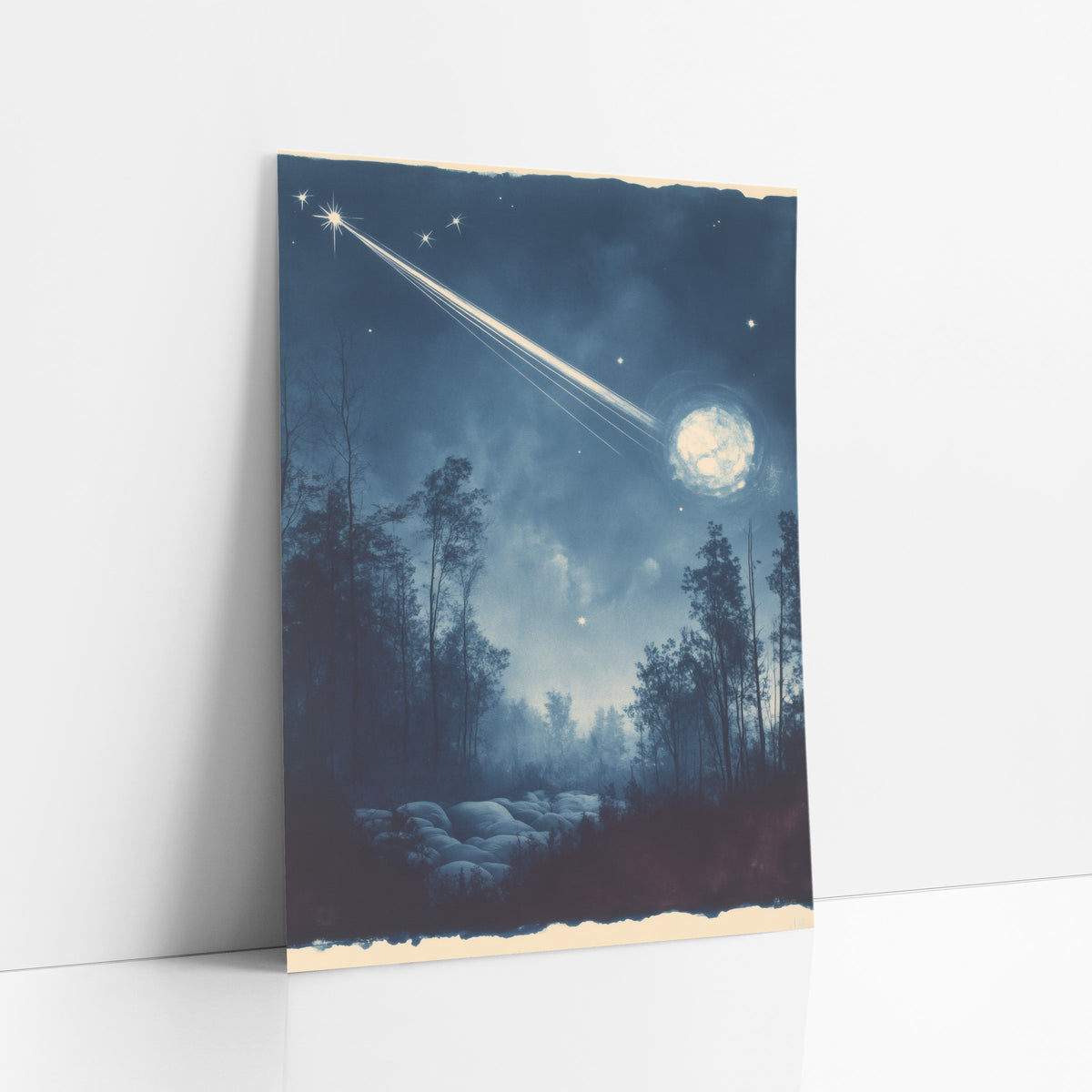 Comet Streaking Night Forest Cyanotype art print leaning against a white wall – bright comet streaking across a deep blue