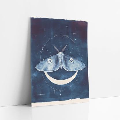Moth and Crescent Moon Celestial art print leaning against a white wall – pale blue moth with eye spots above a white