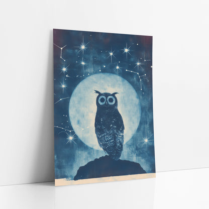 Midnight Owl Celestial Constellation Study art print leaning against a white wall – tufted owl on a dark rock before a large