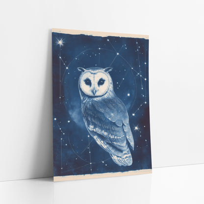 Midnight Blue Owl Constellation Cyanotype Style art print leaning against a white wall – owl with a pale heart-shaped face