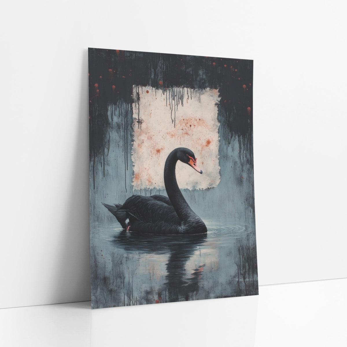 Swan Beneath Ink Drips Moody art print leaning against a white wall – black swan with coral beak floating on rippled
